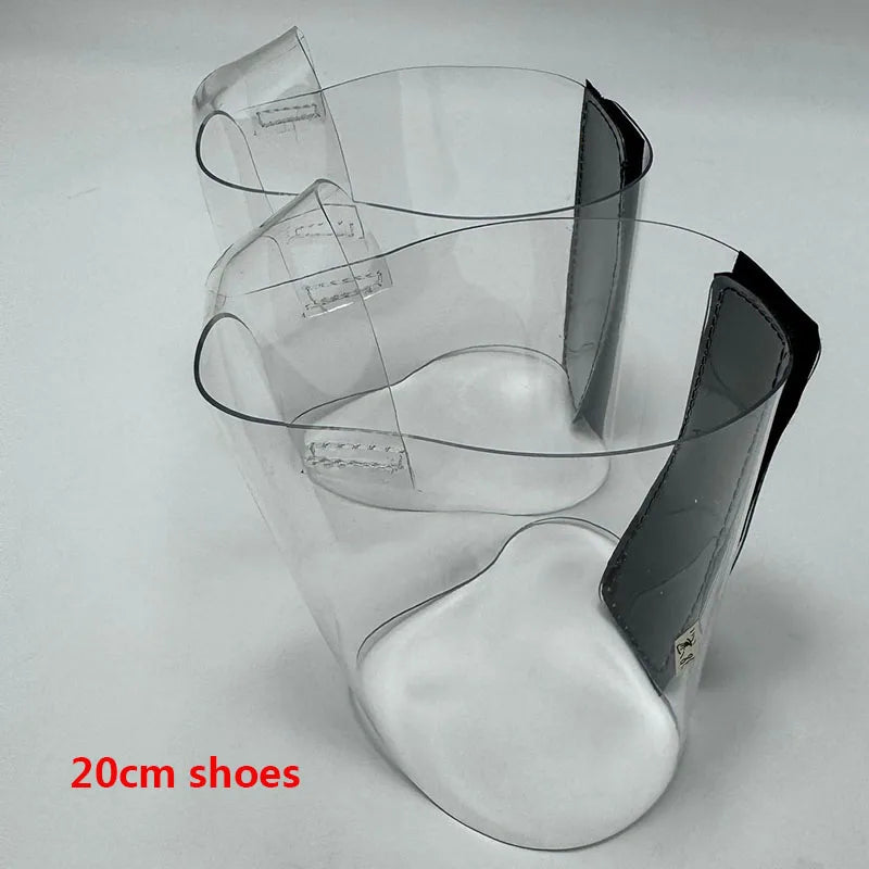 Pair of Transparent platform protectors with a black rear hook-and-loop closure for 20 cm pole dance heels