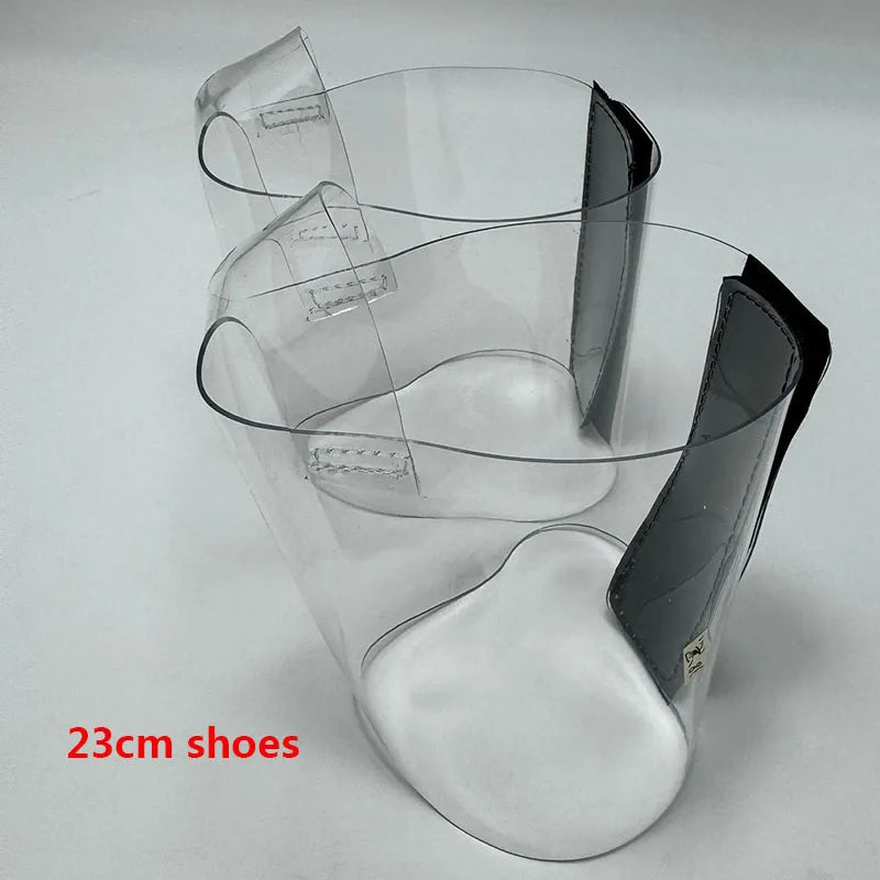 Pair of Transparent platform protectors with a black rear hook-and-loop closure for 23 cm pole dance heels