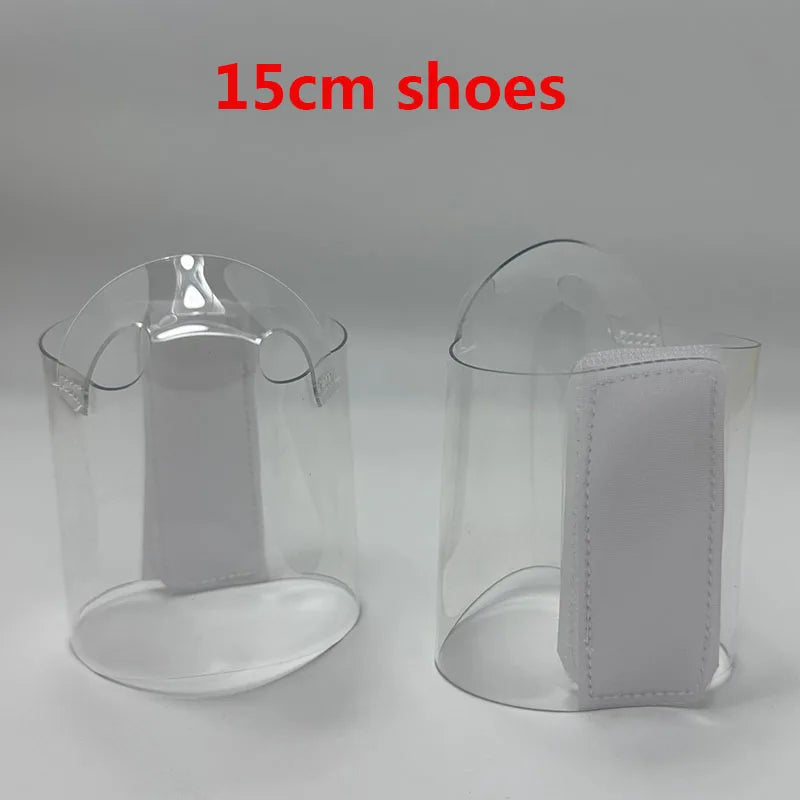 Pair of Transparent platform protectors with a white rear hook-and-loop closure for 15 cm pole dance heels