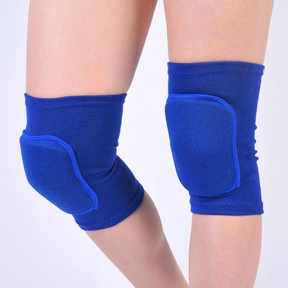 Blue closed knee pads with padded protection over knees, worn on legs, elastic fabric.