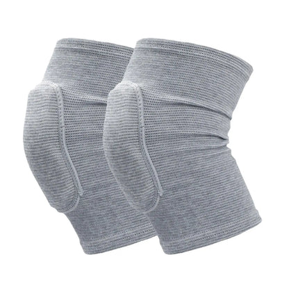Grey closed knee pads with padded knee protection displayed on plain white background, elastic fabric.