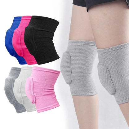 Mixed set of ribbed closed knee pads in blue, hot pink pink, black, grey, white  and light pink colors with padded knee protection, grey set worn on legs shown from the side.
