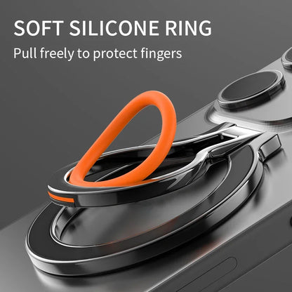 Close-up of an orange silicone ring on a magnetic phone holder attached to the back of a smartphone, emphasizing finger protection.