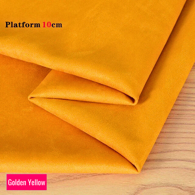 Golden Yellow stretch fabric for platform protector, suitable for 10cm platform pole dance shoes, shown folded on wooden surface