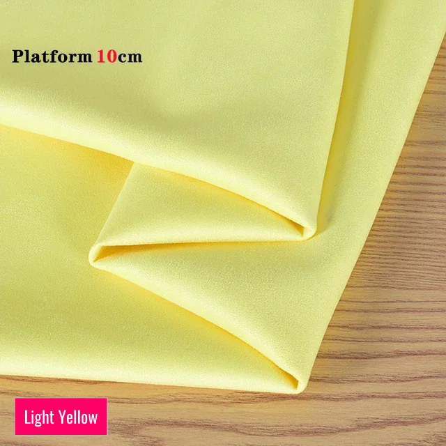 Light Yellow stretch fabric for platform protector, suitable for 10cm platform pole dance shoes, shown folded on wooden surface