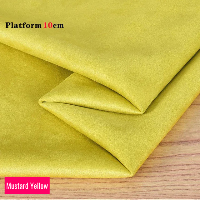 Mustard Yellow stretch fabric for platform protector, suitable for 10cm platform pole dance shoes, shown folded on wooden surface