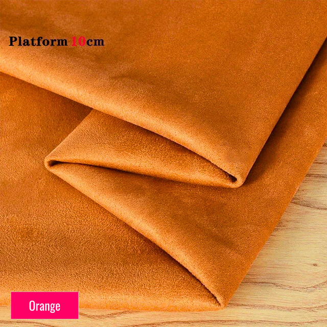 Orange stretch fabric for platform protector, suitable for 10cm platform pole dance shoes, shown folded on wooden surface