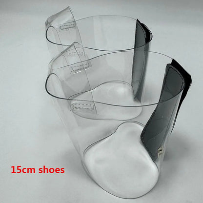 Pair of Transparent platform protectors with a black rear hook-and-loop closure for 15 cm pole dance heels