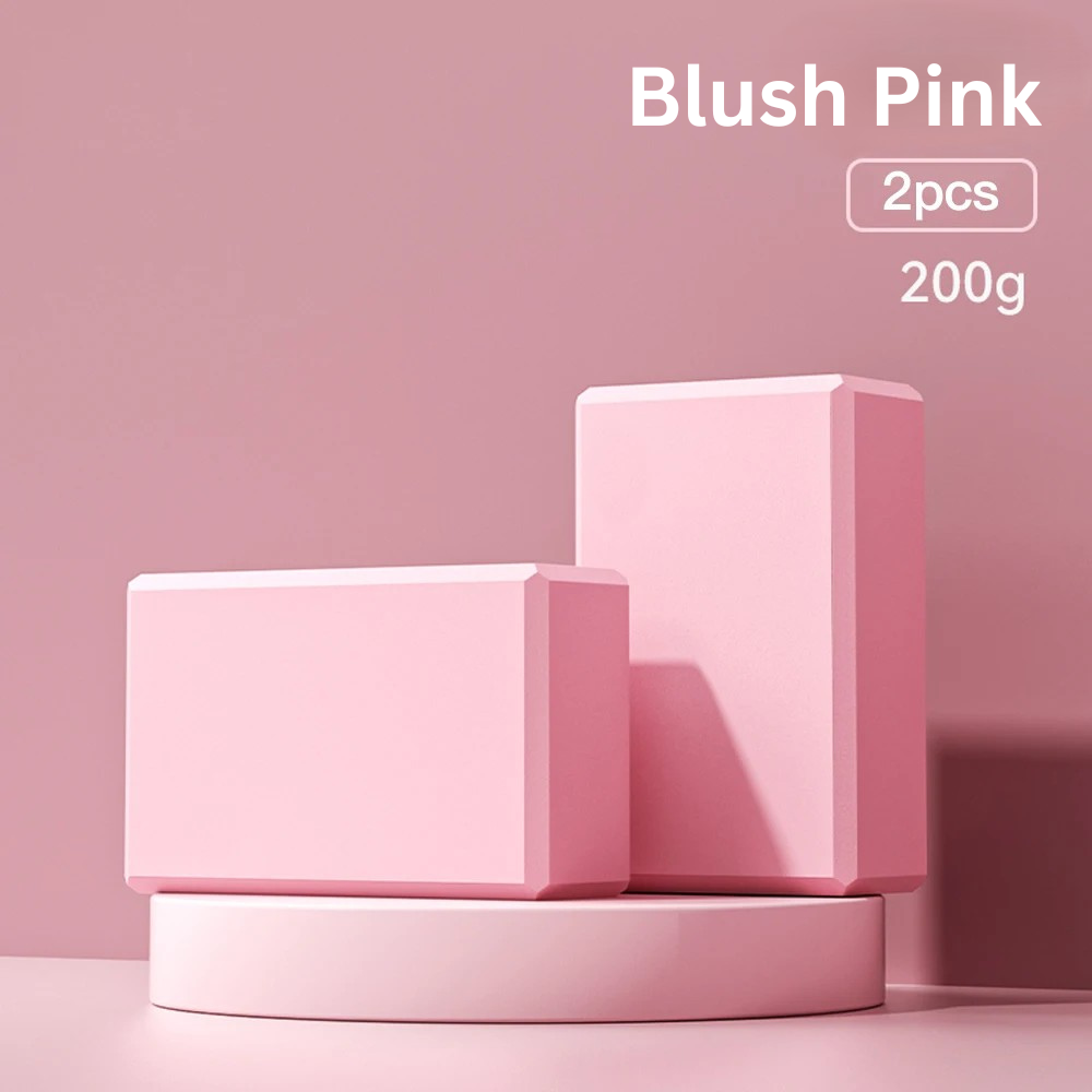 Two blush pink high-density foam yoga blocks on a blush pink display stand, indicating 'blush pink, 2pcs, 200g'.